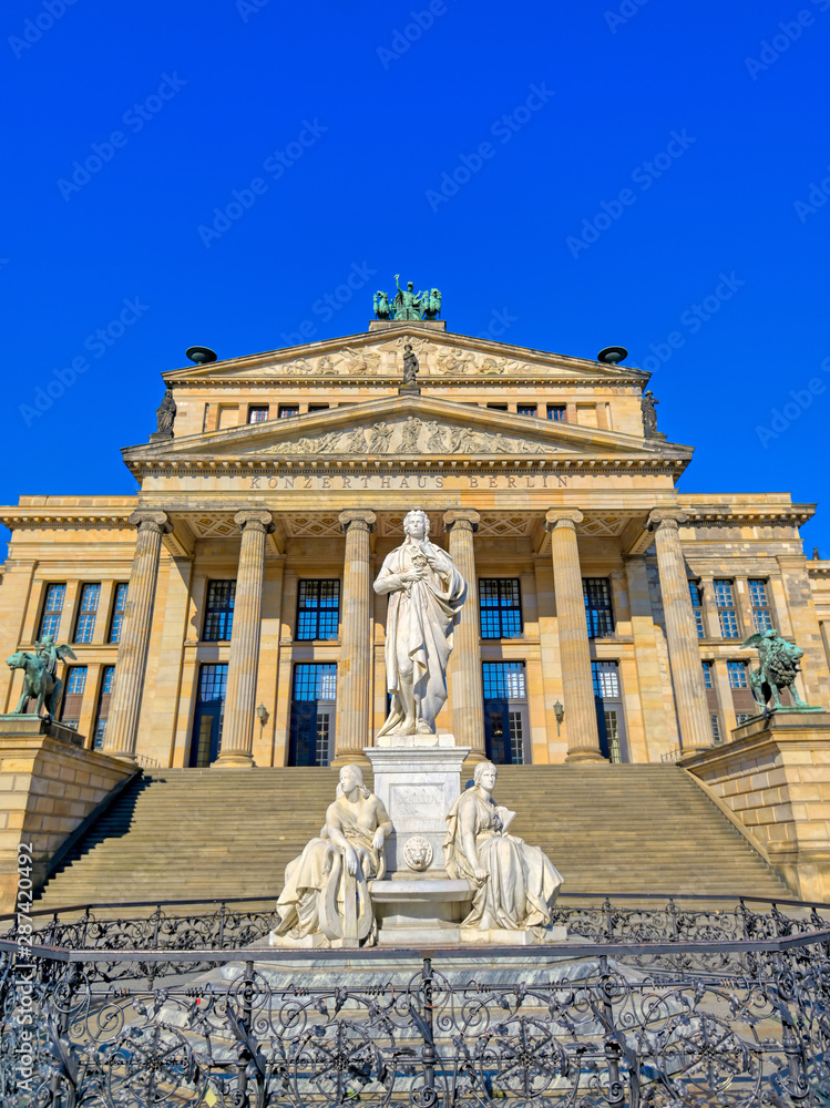 Fototapeta premium The Gendarmenmarkt square in Berlin, Germany which houses the Berlin Concert Hall (Konzerthaus) and the French and German Churches.