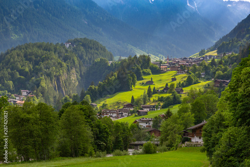 View of Finkenberg and mountains viewed from Mayrhofen, Tyrol, Austria photo