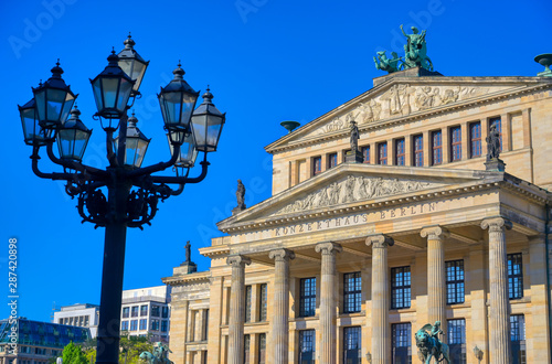 The Gendarmenmarkt square in Berlin, Germany which houses the Berlin Concert Hall (Konzerthaus) and the French and German Churches. © Jbyard