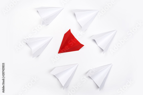 Free Download Group of white paper plane in one direction and one red paper plane pointing in different way on white background. Business for innovative - GFXLoad