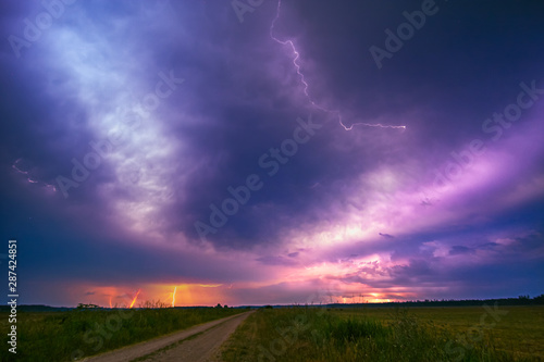 Lightning with dramatic clouds composite image . Night thunder-storm