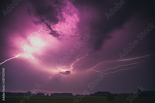 Lightning with dramatic clouds composite image . Night thunder-storm