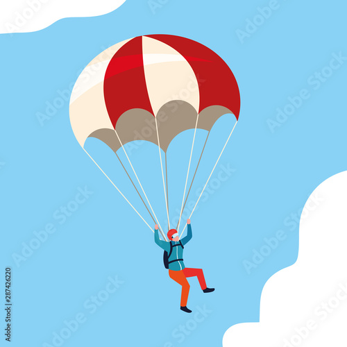 man skydiver in air with parachute open
