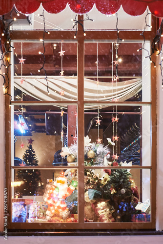 New Year's window in a cafe. holiday and comfort. © Olek