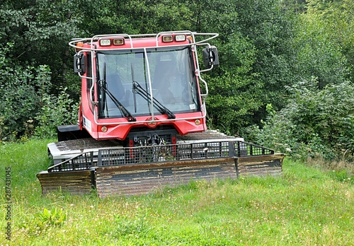 detail view, modern snowcat and nature