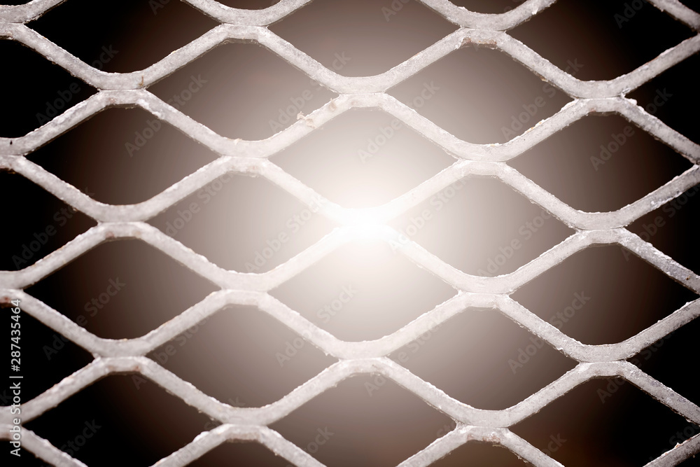 backlit cell grill on a black background backlit cell grill on a black background