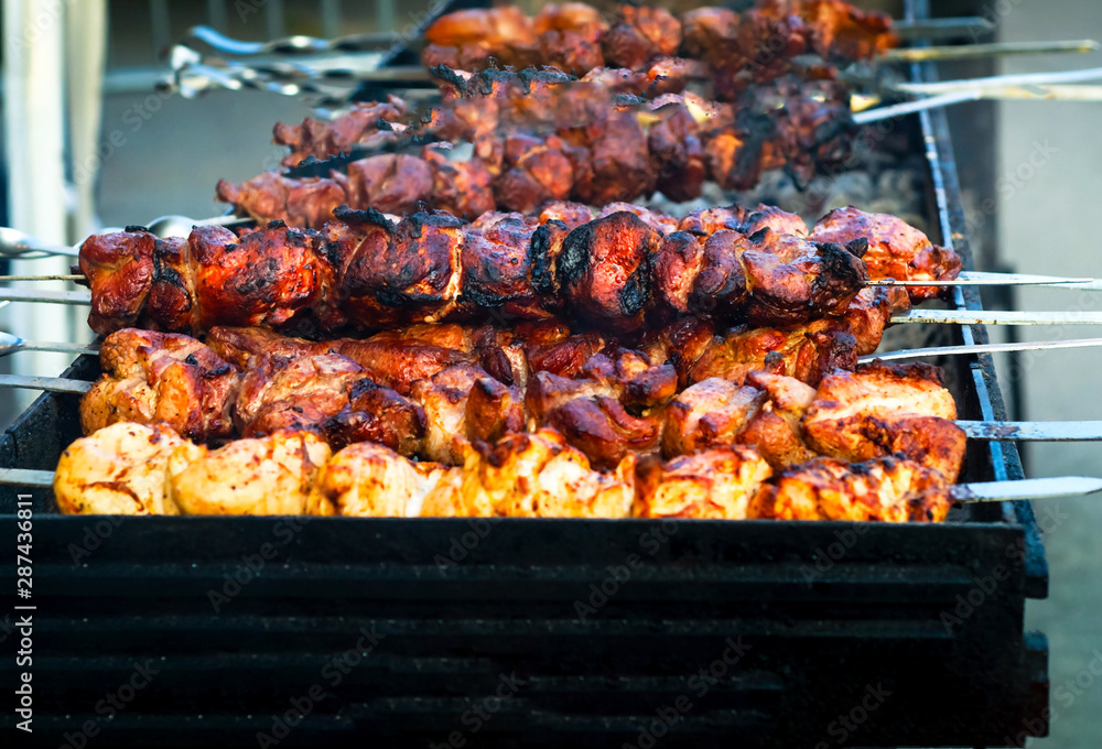 Grilled meat slices. Concept of street food or festival.Close-up
