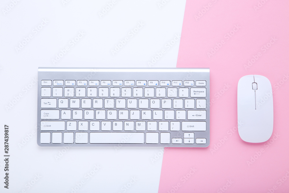 Computer keyboard and mouse on colorful background Computer keyboard and mouse on colorful background