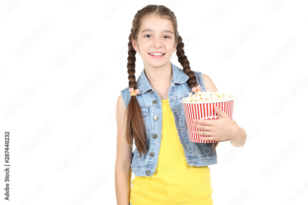 Beautiful young girl holding bucket with popcorn on white background Beautiful young girl holding bucket with popcorn on white background