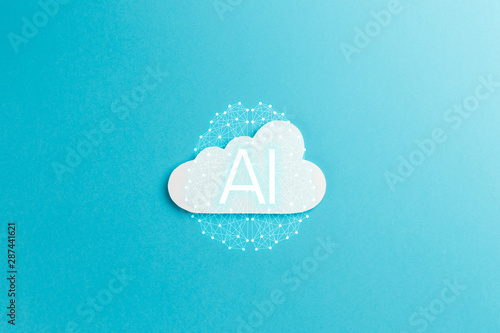 Cloud technology concept. Minimalistic cloud on blue background. Concept AI(Artificial Intelligence). Neural networks, machine and deep learning, and another modern technologies concepts photo