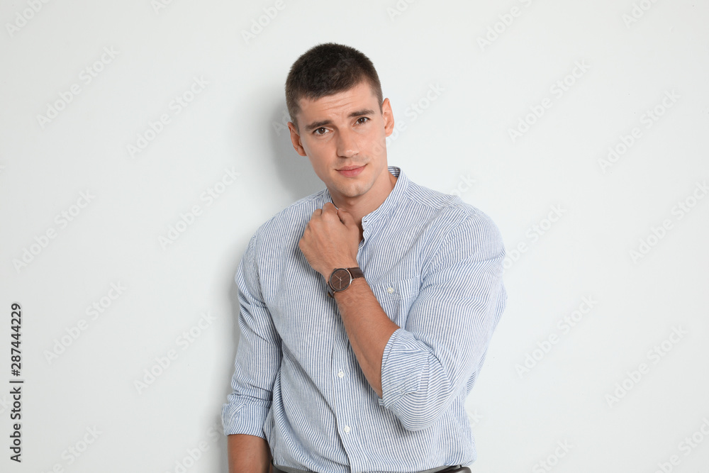 Portrait of handsome young man on light background Portrait of handsome young man on light background