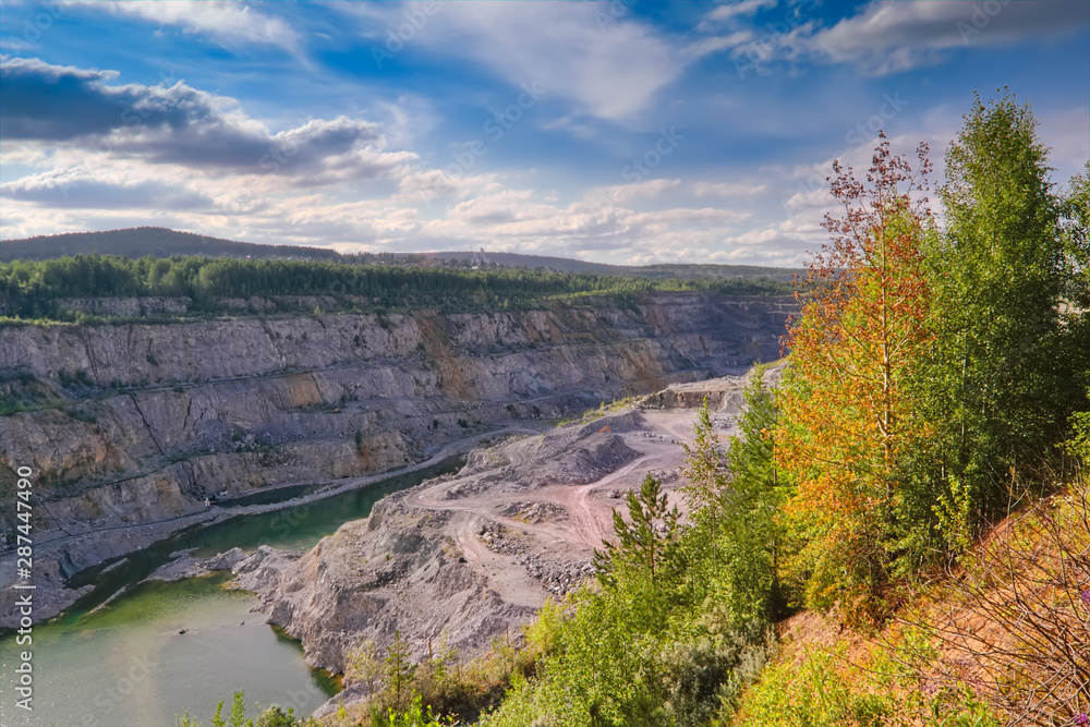 Top view of a large quarry dolomite. Top view of a large quarry dolomite with water.