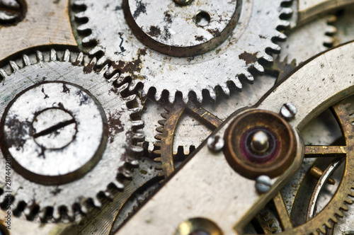 Clockwork, gears in an old watch. Teamwork concept, idea, technology, eternity, business. Macro