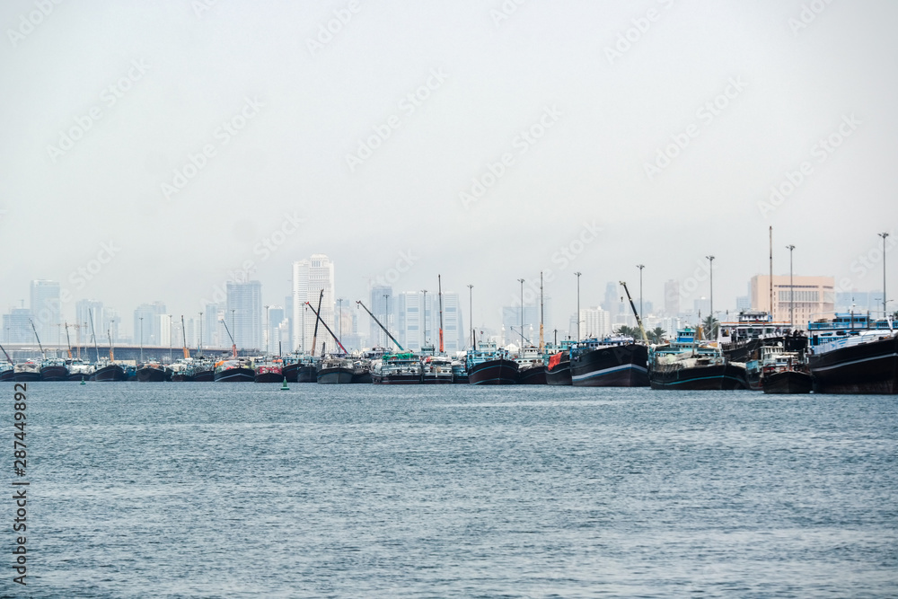 Boats and skyline at the Coast in Dubai