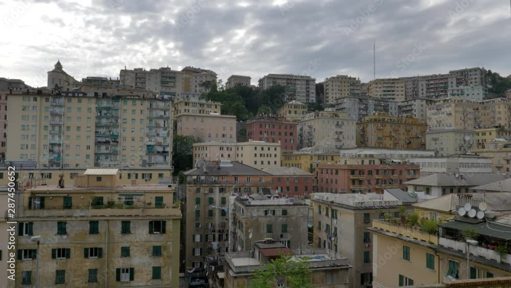 Multiple colorful buildings in Genoa, View from a rooftop