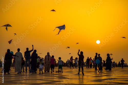 Playing with kites in Hassan II Mosque of Casablanca. Morocco