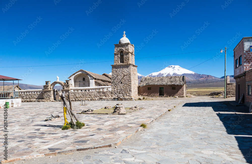 The small Andean town of Sajama, with the Sajama volcano in the background. Bolivian Altiplano. Bolivia. South America