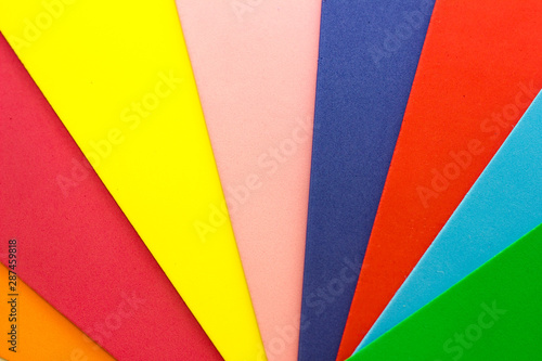 abstract background with multicolored paper. Rainbow concept