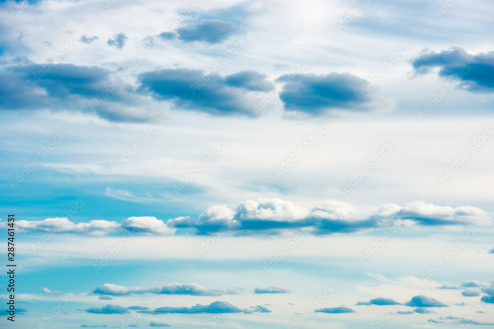 Blue sunset sky background with white clouds Blue sunset sky background with white clouds