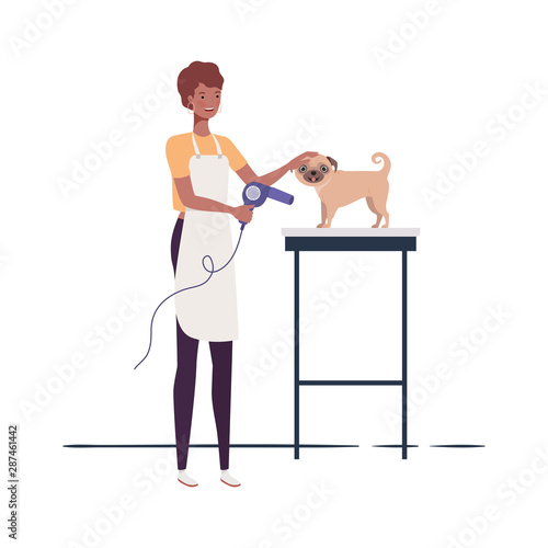 young woman with dog in pet groomer