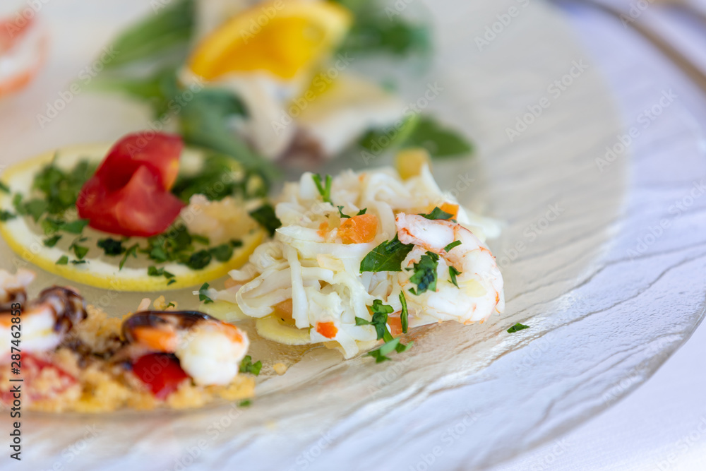 Elegant restaurant serving sea food and salad specialty Elegant restaurant serving sea food and salad specialty