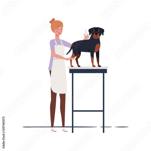 young woman with dog in pet groomer