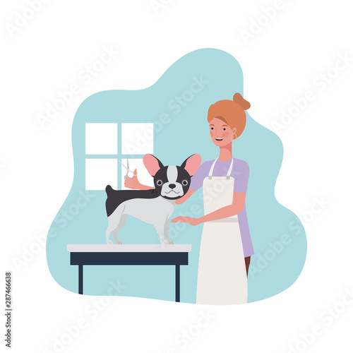 young woman with dog in pet groomer