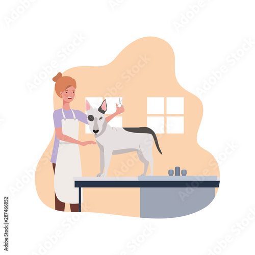 young woman with dog in pet groomer