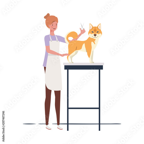 young woman with dog in pet groomer