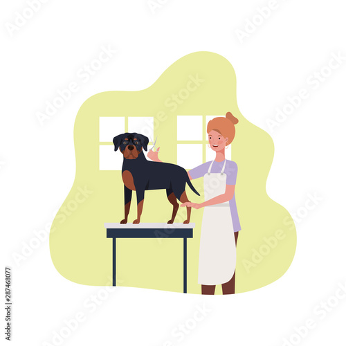 young woman with dog in pet groomer