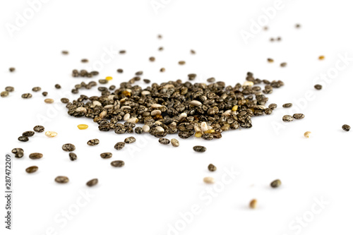 Organic Chia Seed, super food over white background. Healthy breakfast, vitamin snack, diet.