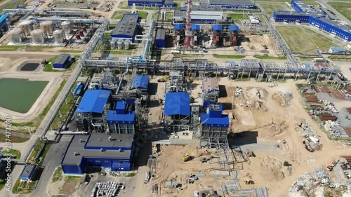 Plant for the production of liquefied natural gas. Construction of a factory for pumping liquefied gas. Aerial shooting with a drone.