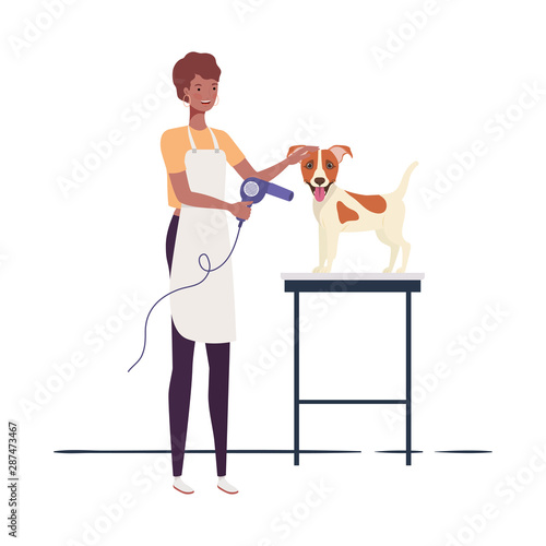 young woman with dog in pet groomer