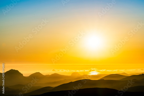 Sun over Ocean, Mountains, Afternoon