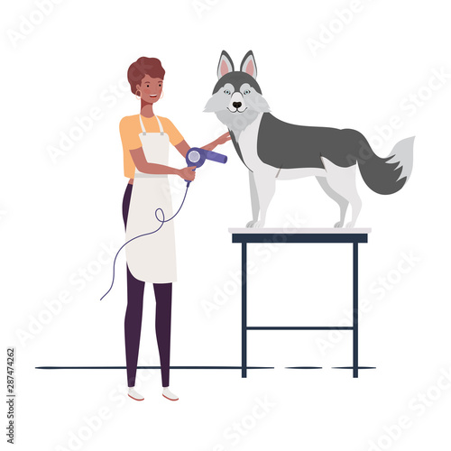 young woman with dog in pet groomer