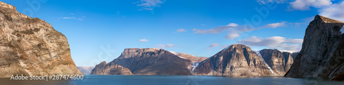 Panoramic view of the cliffs and mountains in Buchan Gulf, Baffin Island, Canada. photo
