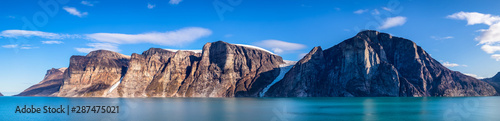 Panoramic view of the cliffs and mountains in Buchan Gulf, Baffin Island, Canada. © Ruben