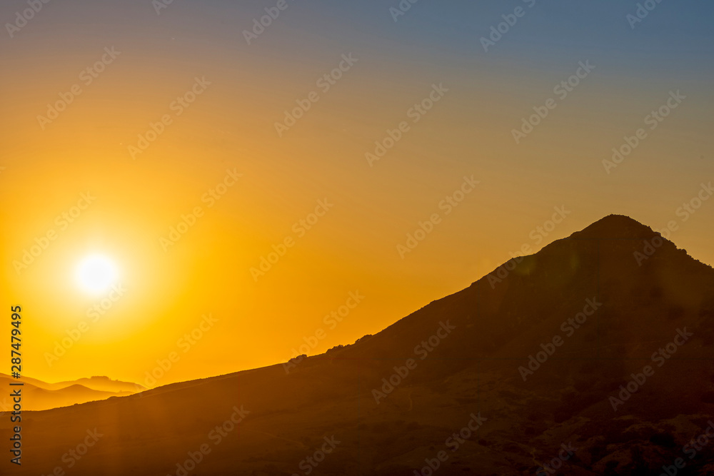 Setting Sun, Silhouetted Hill, Peak, Mountain Setting Sun, Silhouetted Hill, Peak, Mountain