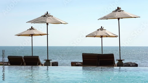 Infinity pool with a beautiful relaxing sea view. photo