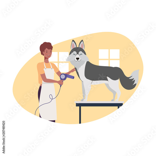 young woman with dog in pet groomer