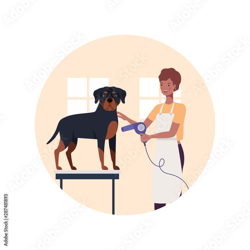 young woman with dog in pet groomer