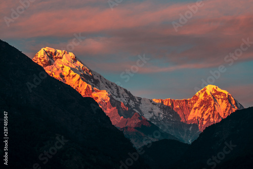 Annapurna Mountain with beautiful sky of colorful sunrise, Nepal