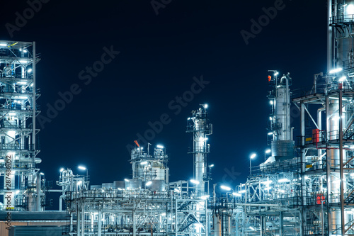 Industrial view oil and gas refinery Detail of equipment oil pipeline steel at night background
