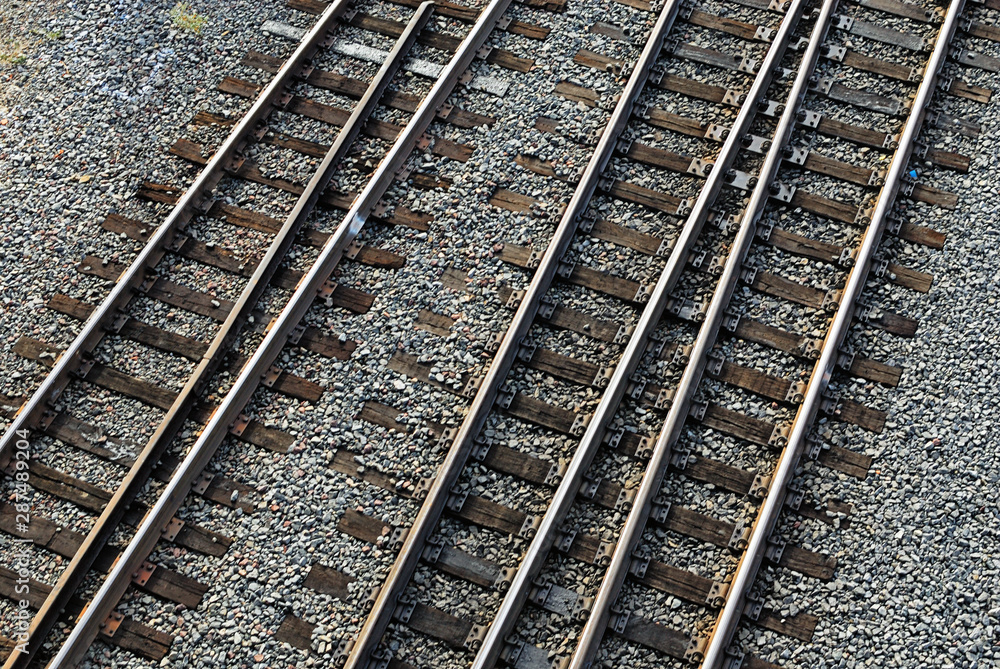 A set of railroad tracks as seen from above.