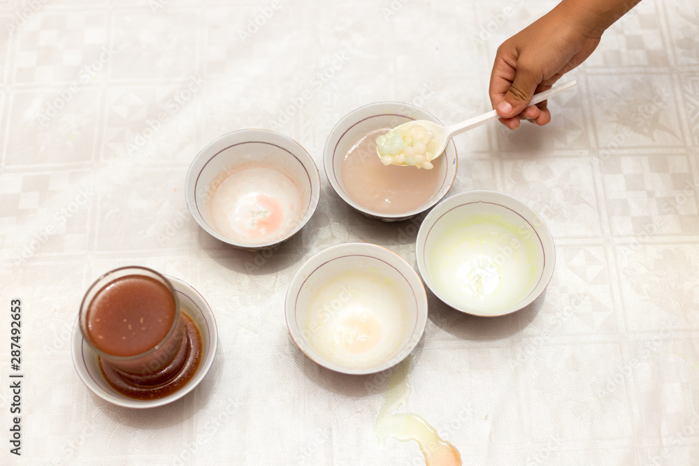 multi-colored sweets dissolve in water, all paints and harmful substances fall into the water, it is dangerous for children and for humans multi-colored sweets dissolve in water, all paints and harmful substances fall into the water, it is dangerous for children and for humans