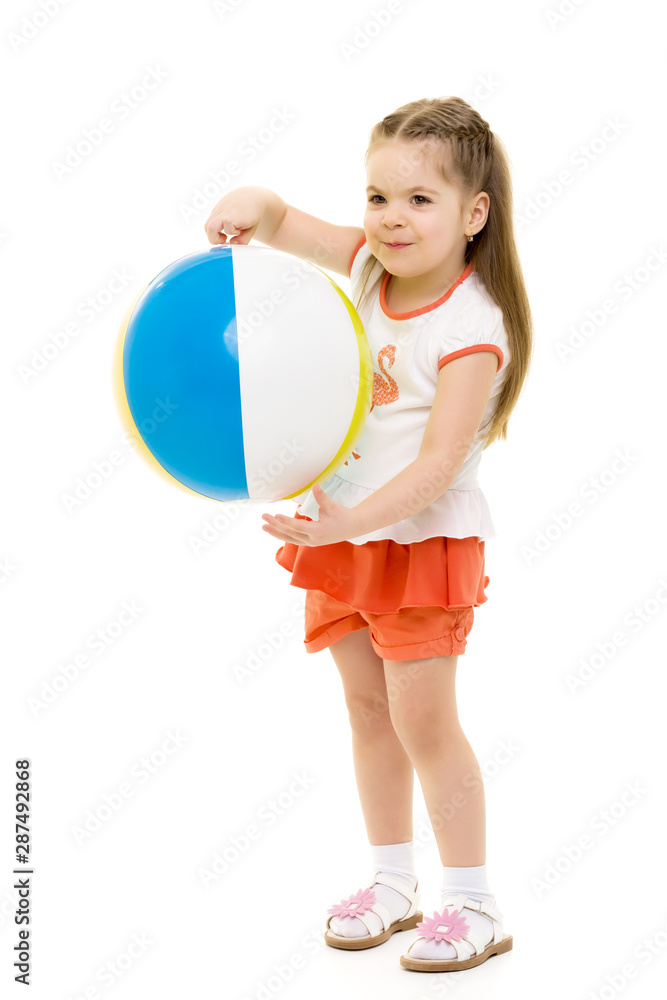 Little girl is playing with a ball Little girl is playing with a ball