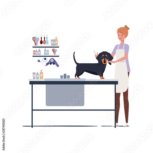 young woman with dog in pet groomer