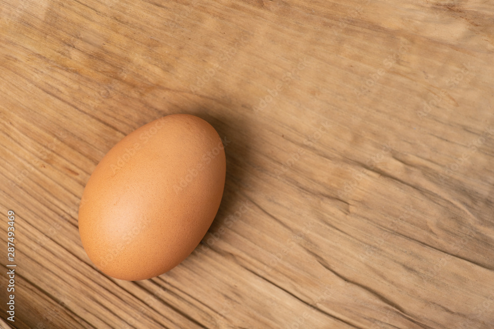 Chicken eggs on dry leaves.soft focus.