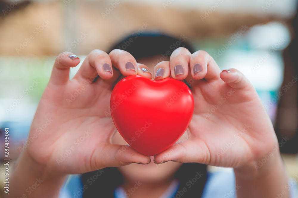 Woman hold red heart Woman hold red heart