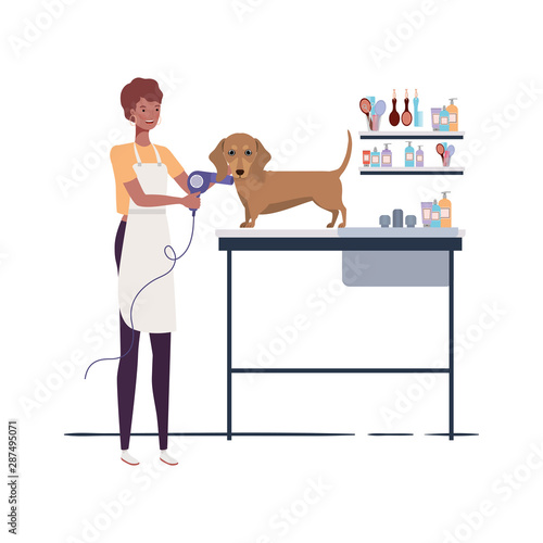 young woman with dog in pet groomer